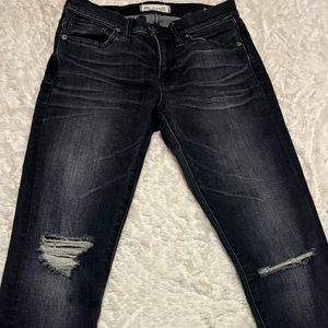 Madewell-high rise skinny jeans . Size 26. Distressed, black, stretchy.